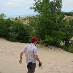 hiking the dune Mark descends the dune.